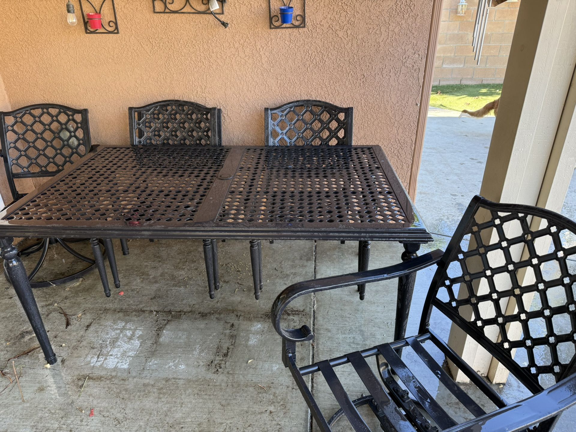 Patio Table With chairs (some Cushions)