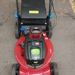 TORO LAWN MOWER 60V LITHIUM 21IN SELF DRIVE WITH BATTERY AND CHARGER 
