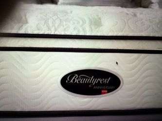 King-size Simmons beauty rest mattress and box springs. 250