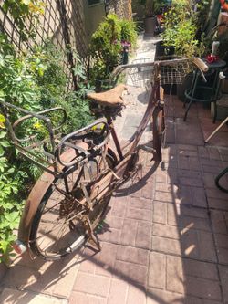 Vintage Cruiser Bicycle with front basket and rear child seat