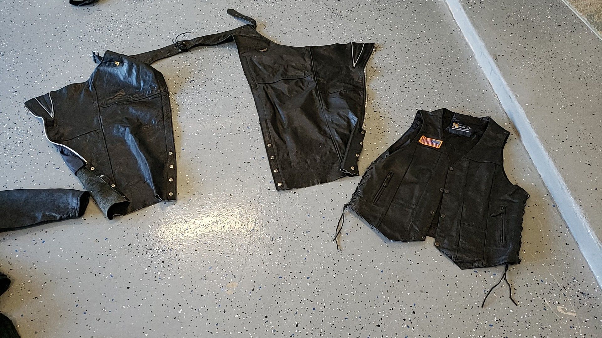 Motorcycle jackets and chaps with vest.