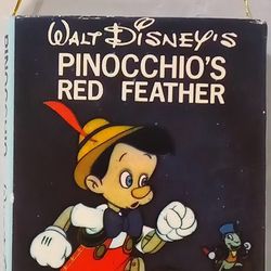 Walt Disney's Pinocchio's Red Feather Mini Book Ornament

