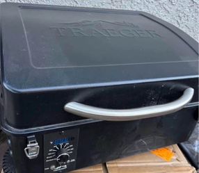 Portable Traeger pellet grill smoker  with carry bag