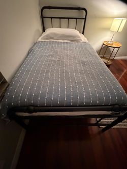 Twin size bed frame with mattress
