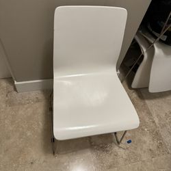 4 Chairs White Excelent Condition  $20 Each 