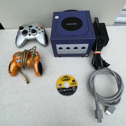 GOOD WORKING CONDITION NINTENDO GAME CUBE W/2 CONTROLLERS AND ONE GAME PAC-MAN  FOR SALE 