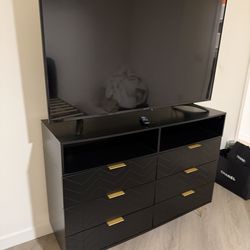 Dresser, bed frame, smart tv