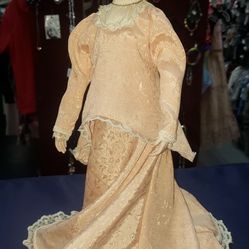 This is a vintage Sandra Kuck "Expectant Moments" / "Precious1 Memories of Motherhood" porcelain doll 