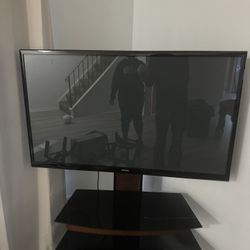 Black 54’ in Samsung Tv and stand