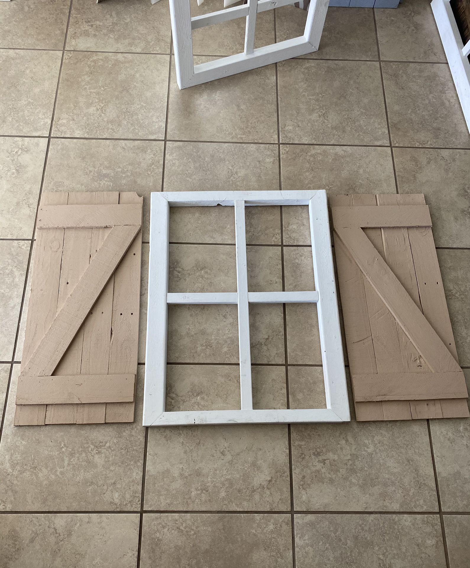 Window frame with shutters
