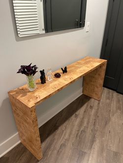 CB2 niche natural Burl 54” console