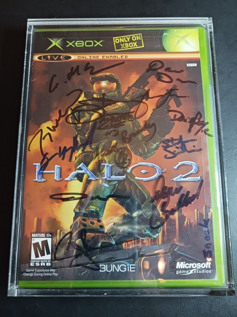 Halo 2 "do not sell before 11/09/04" signed x13 at Bungie prior to release.