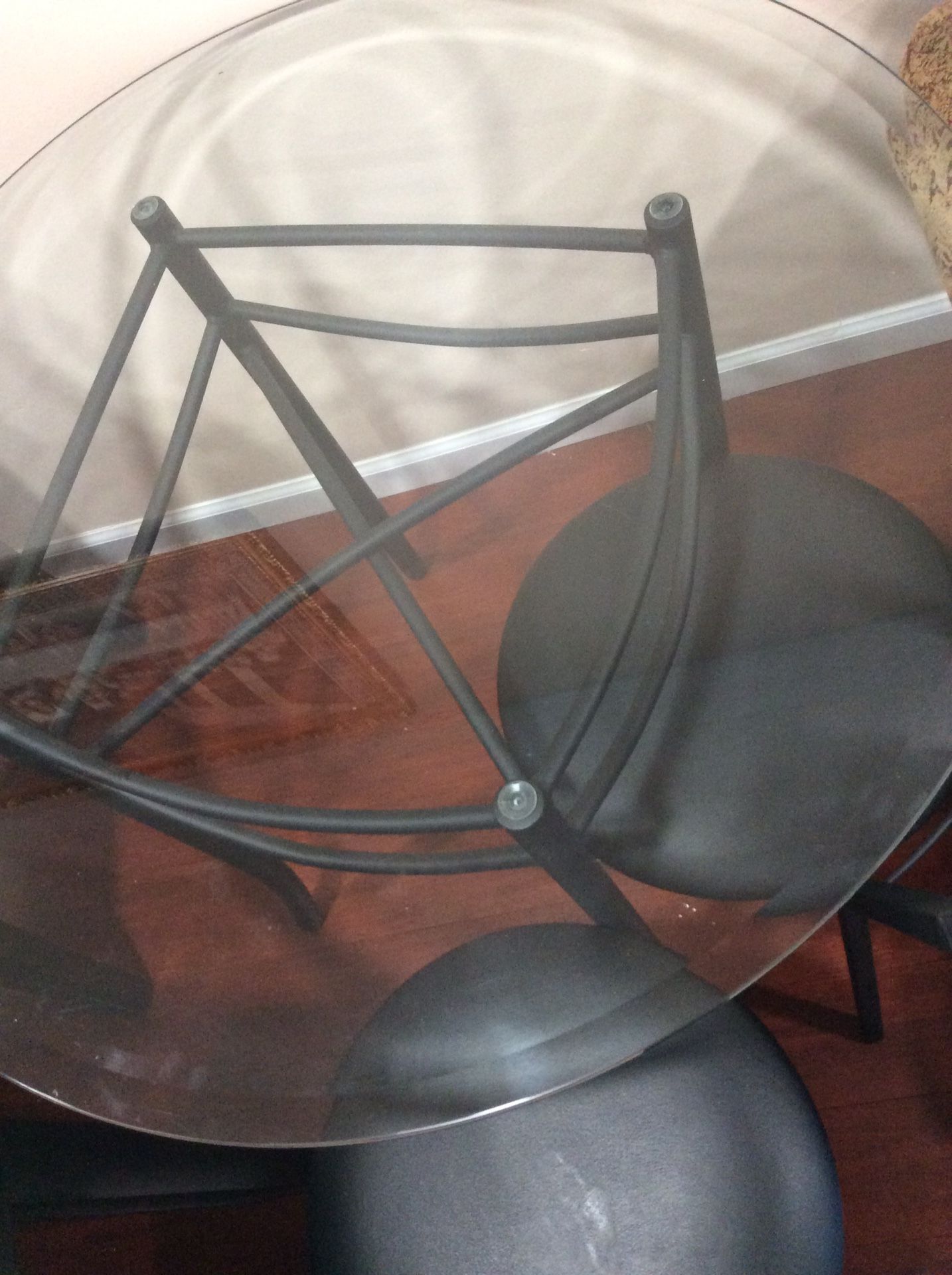 Glass top table and 4 chairs $65