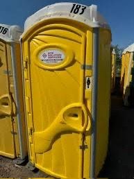 Yellow portable toilet