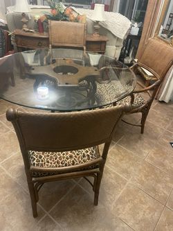 Unique glass top dinning table and chairs