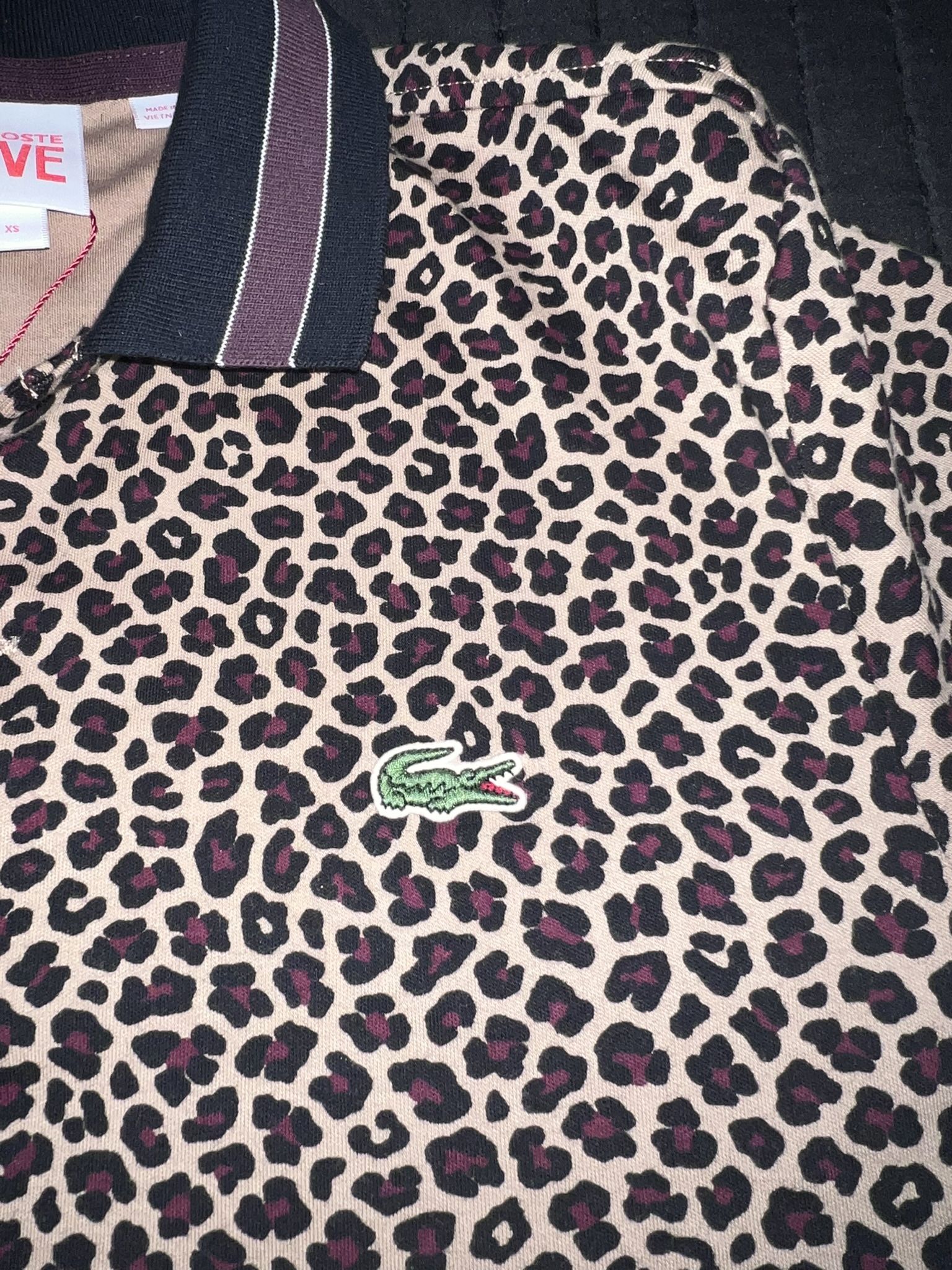 Polo lacoste leopardo hotsell