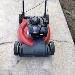 A Yard Machine 21 Inch Self-propelled Also Craftsman 6.75 Self-propelled