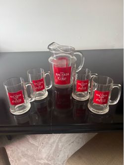 Glass pitcher and 4 mugs
