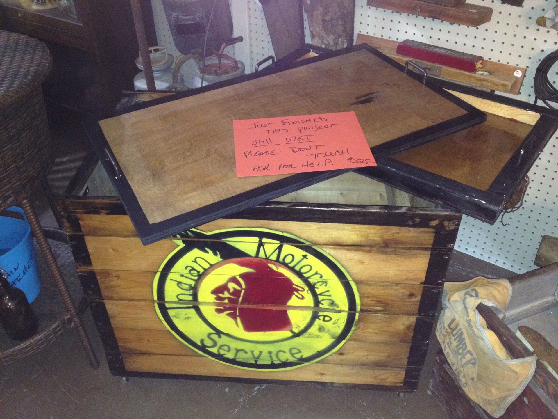 Indian motorcycle services crate. Has a pull out shelf and lid. Also on wheels. Great for storage. Dimensions are 32" long. 20" front to back. 26" ta