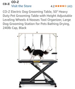 Dog grooming table