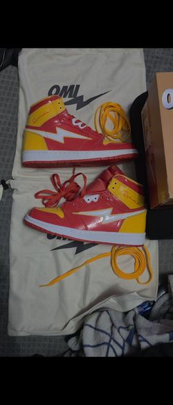 Omi Zero 3.0 "All American Ach" high-top sneakers in a red and yellow colorway.