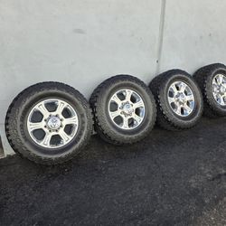 18" Dodge Ram 2500 OEM rims w- 35" Kanati Tires 