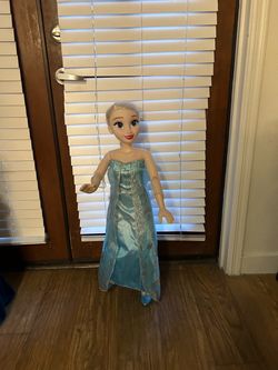 Full size Disney Elsa doll.