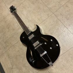 The Loar Arched top Cutaway Hollowbody Electric Guitar