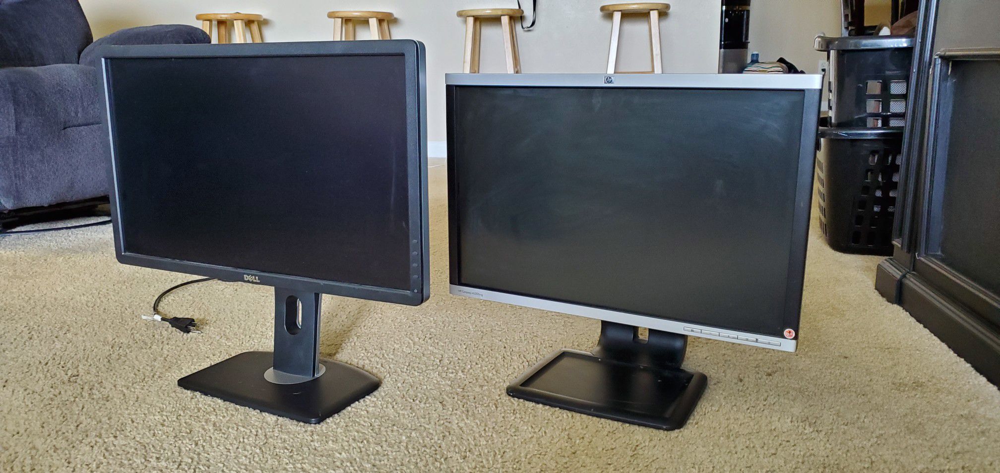 24 inch Dell and 22 inch HP flat screen Monitors