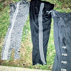 Nike And Adidas And Pink Sweatpants For Men And Women.