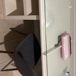 White makeup vanity and chair