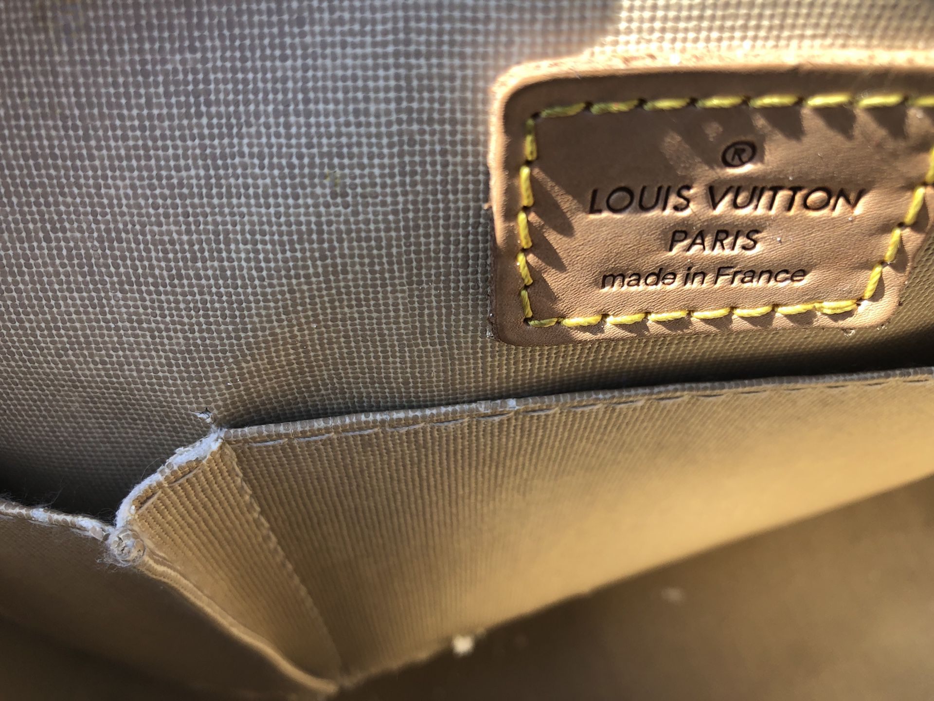 where to find serial number on louis vuitton bag
