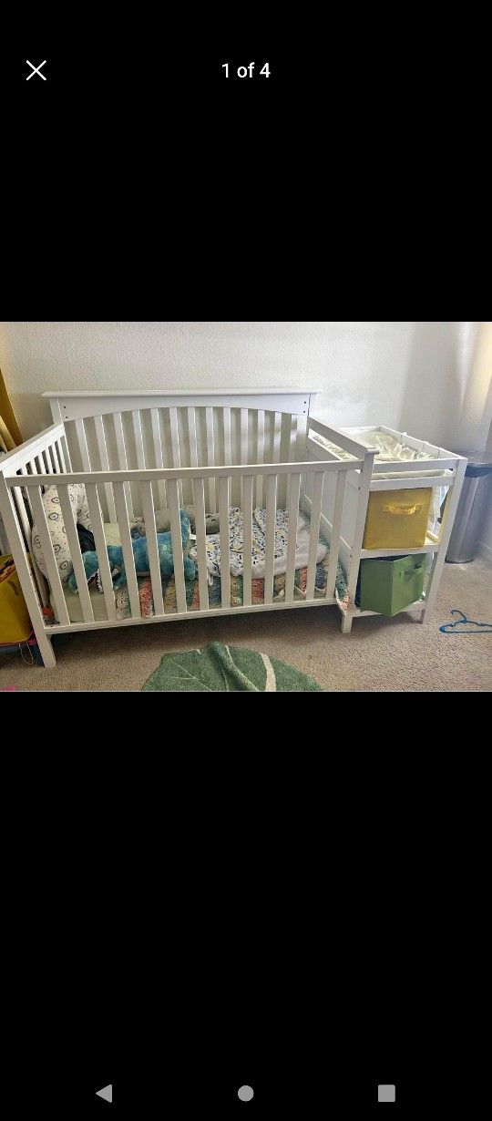 Standard Size Crib With Attached Changing Table As Well As New Mattress And New Sheets 