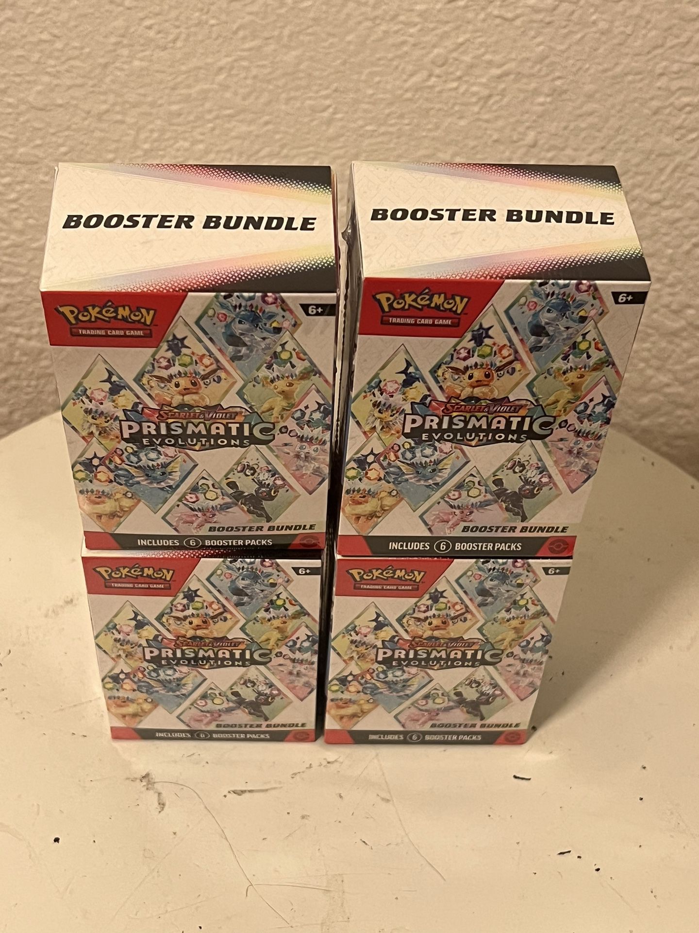 Prismatic Evolution Booster Bundle 