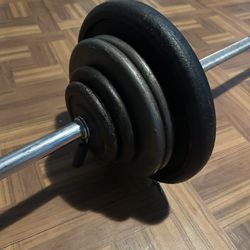 105lbs Weight Plates And 6ft Bar 