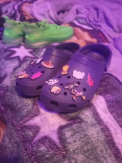Dark Blue Crocs.  Various Pins Included