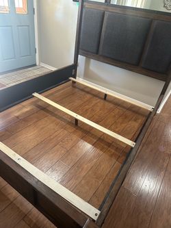 Ashley’s Furniture Queen Bed Frame with Upholstered Headboard