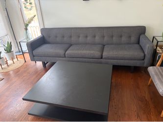 Charcoal, gray sofa, coffee table.