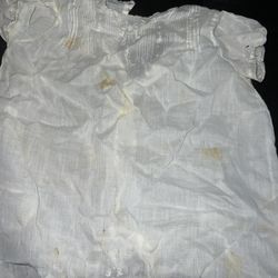 vintage or antique white garment, possibly a baby's dress or christening gown