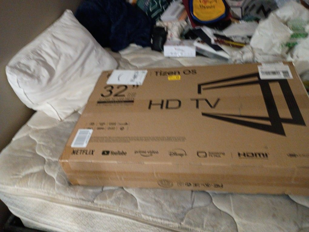 32"Flat Screen T.V. With A Built In DVD Player 