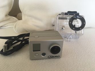 GoPro Hero with LCD screen , waterproof case and USB cable