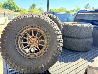 Selling my set of 4 Nitto Ridge Grappler 35x12.50R17LT tires mounted on 17-inch Lock Off-Road bronze wheels