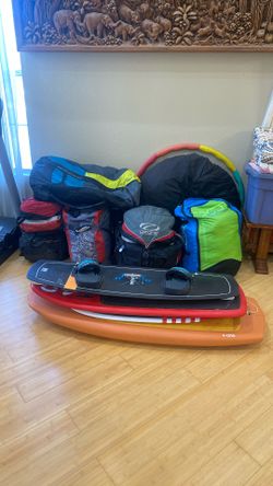 Assorted Kiteboard Gear And Paragliding Wings