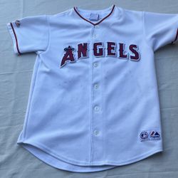 Majestic kids' baseball jersey with bold Angels logo across the chest. Button-front design with red trim on collar and sleeves.See measurements for pr