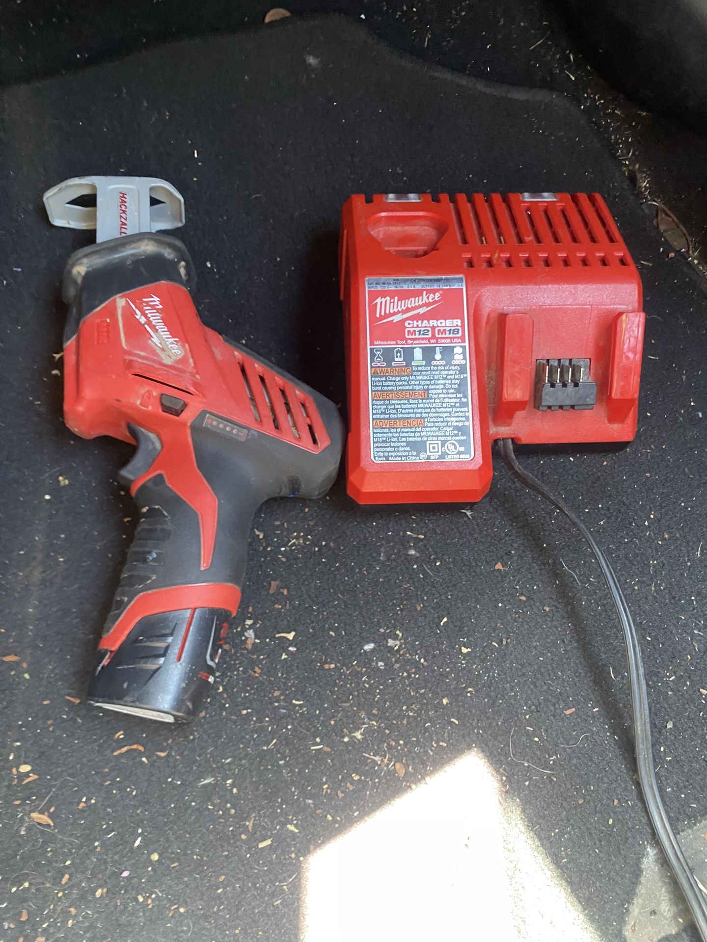 Milwaukee Sawzall & Charger