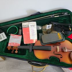 Violin With Many Accessories And Parts