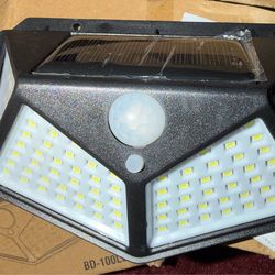 100 LED, Motion Sensor, Solar Lights.  Brand New Lot of 9