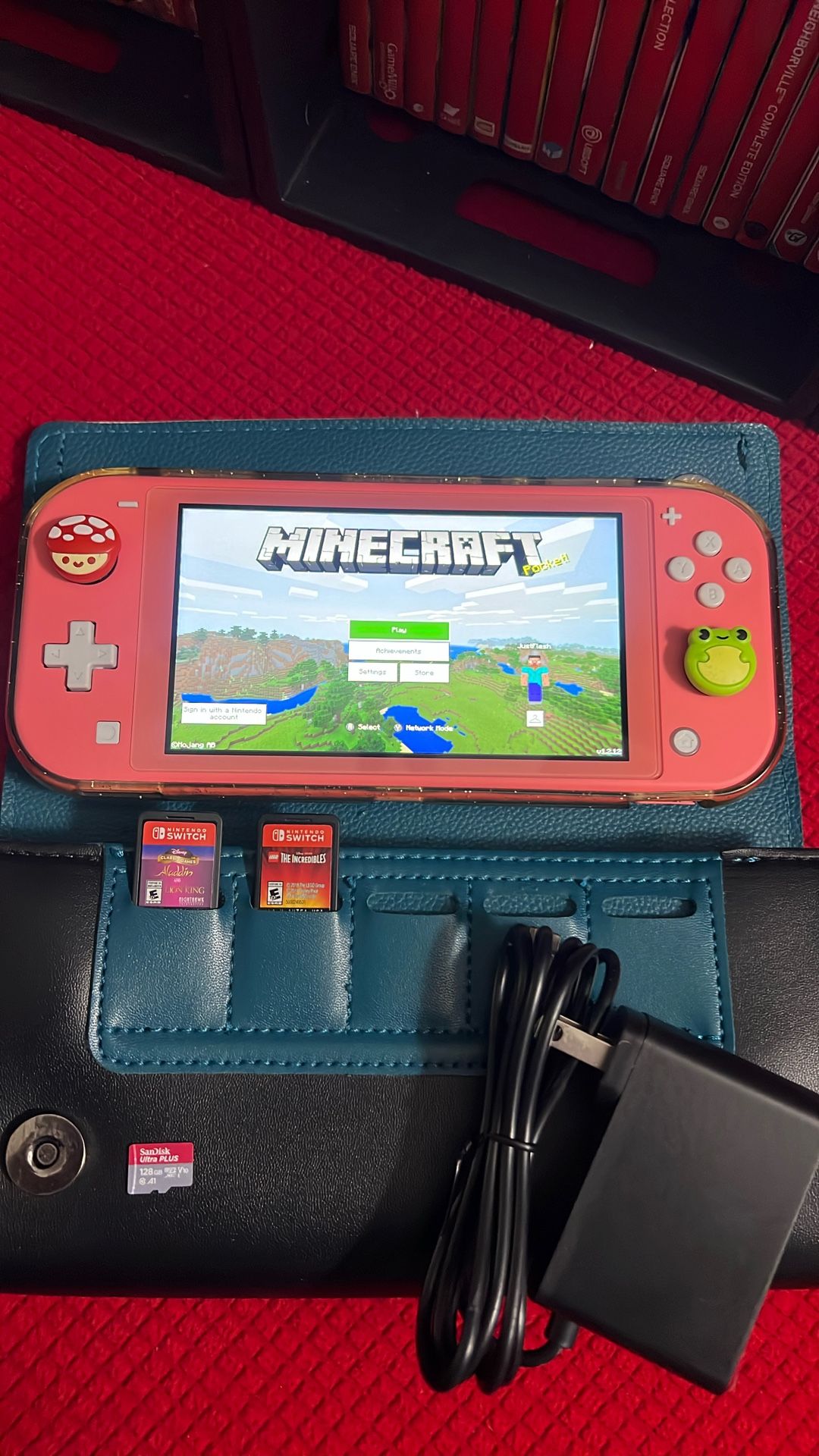 Nintendo Switch Lite. Pink, Comes With 3 Games. Looks Brand New. Perfect Screen. Great Holiday Gift