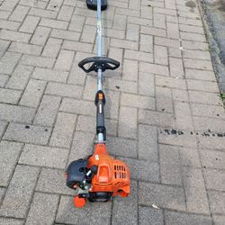 Echo srm-225 gasoline string trimmer, everything works fine and is available.