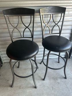 Pair of Swivel Metal Bar Stools